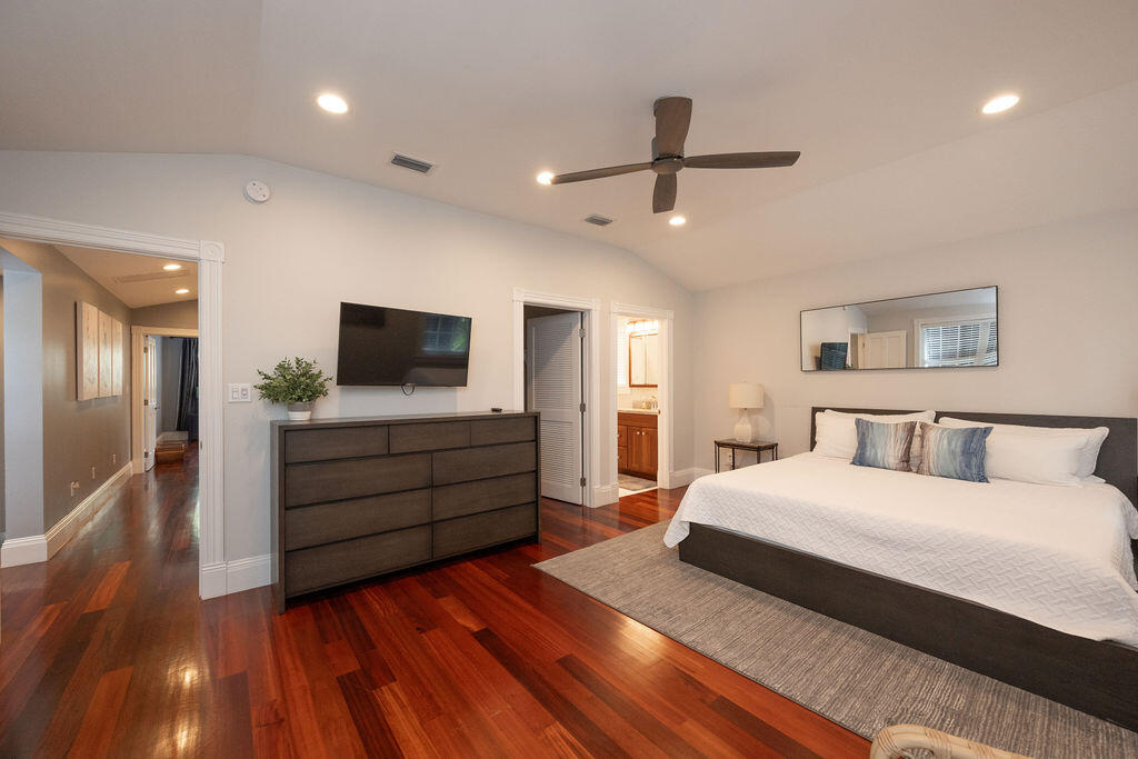 1320 South Street Key West, FL 33040 - Photo 25 of 36 a bedroom with a bed and a flat screen tv