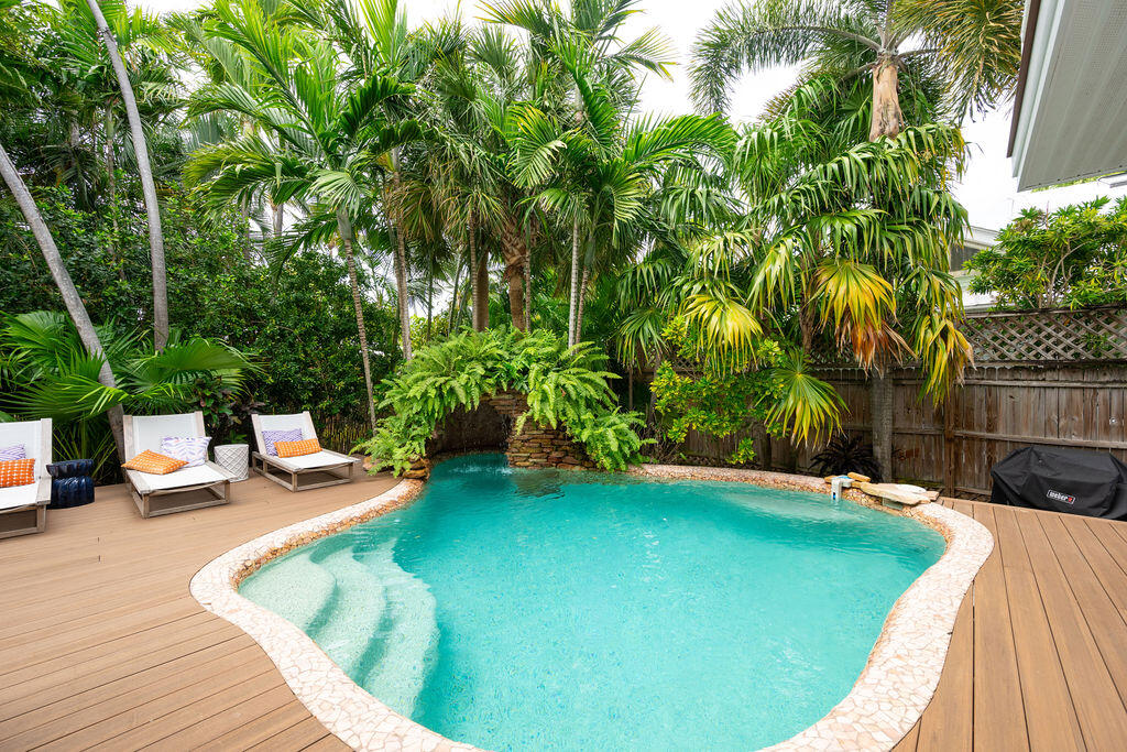 1320 South Street Key West, FL 33040 - Photo 32 of 36 a view of a swimming pool with a patio