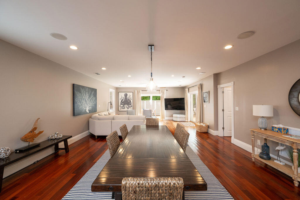 1320 South Street Key West, FL 33040 - Photo 10 of 36 a living room with lots of furniture and a wooden floor