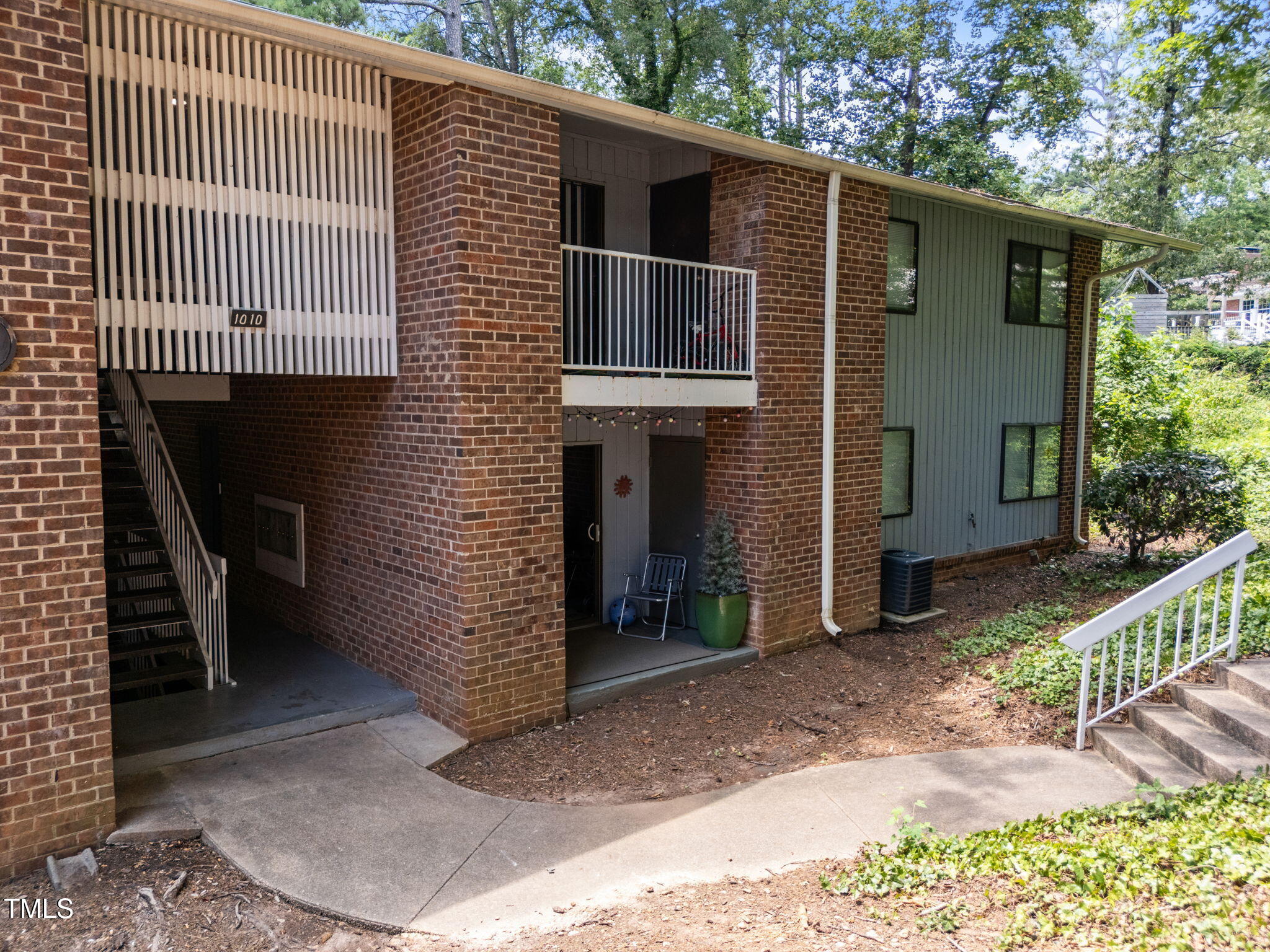1010 Sandlin Place, Unit D Raleigh, NC 27606 - Photo 1 of 21 4-web-or-mls-DJI_20250729141930_0529_D