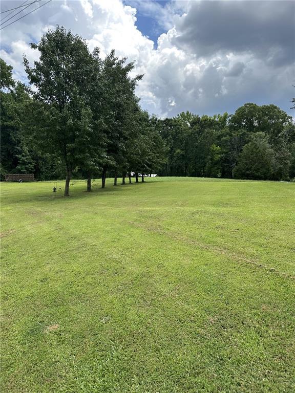 5565 Hog Mountain Road Flowery Branch, GA 30542 - Photo 3 of 5 a view of an ocean and beach
