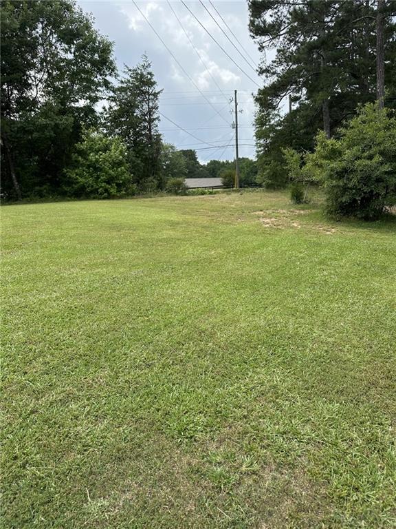 5565 Hog Mountain Road Flowery Branch, GA 30542 - Photo 4 of 5 a view of a field with an outdoor space