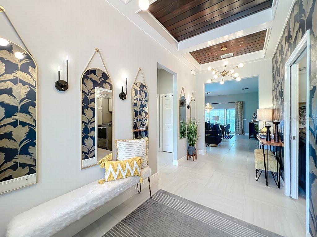 3191 Warbler Loop The Villages, FL 32163 - Photo 3 of 42 a living room with furniture and wooden floor