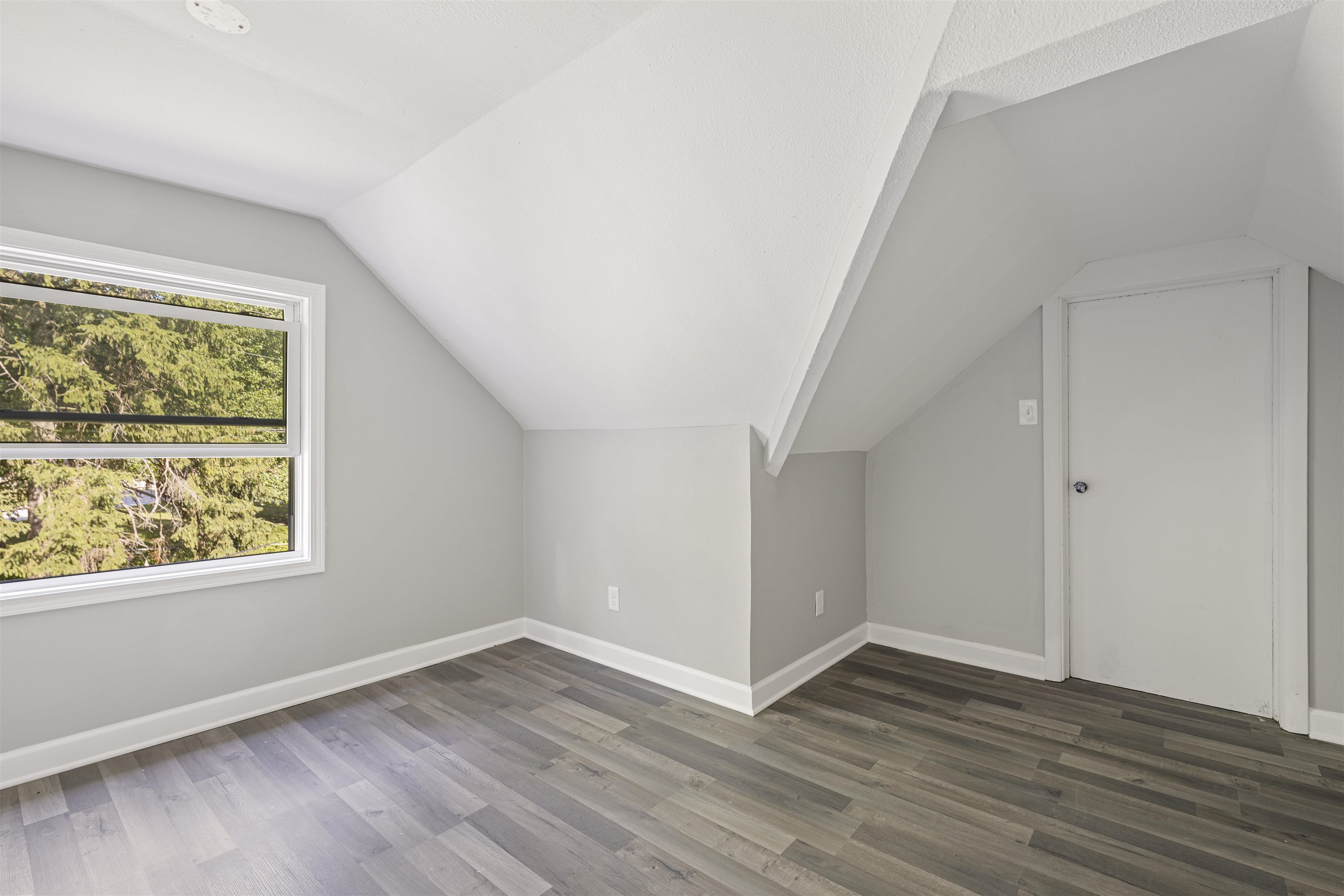 220 South Alpine Road Rockford, IL 61108 - Photo 14 of 18 an empty room with wooden floor and windows