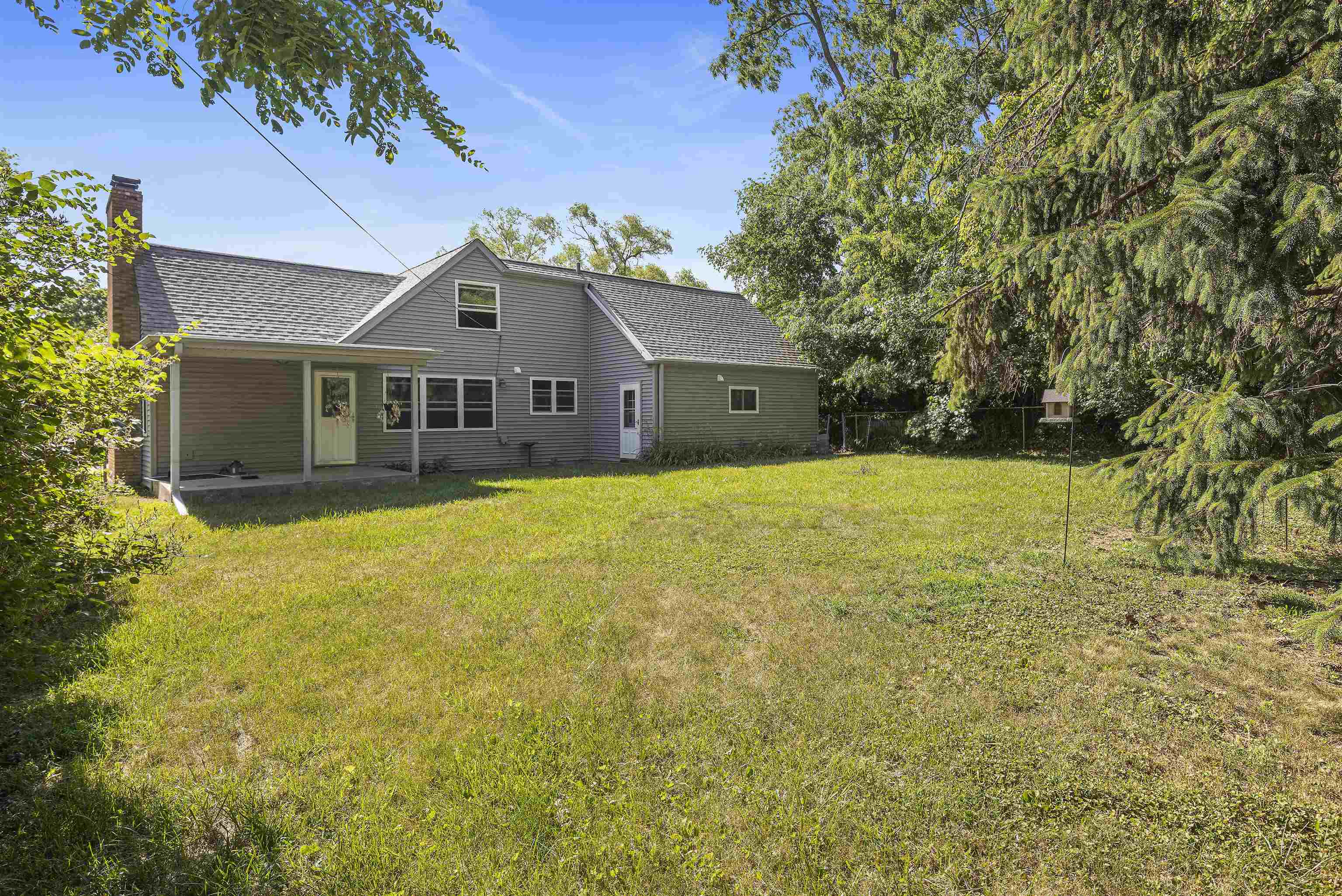 220 South Alpine Road Rockford, IL 61108 - Photo 17 of 18 a view of a house with a yard