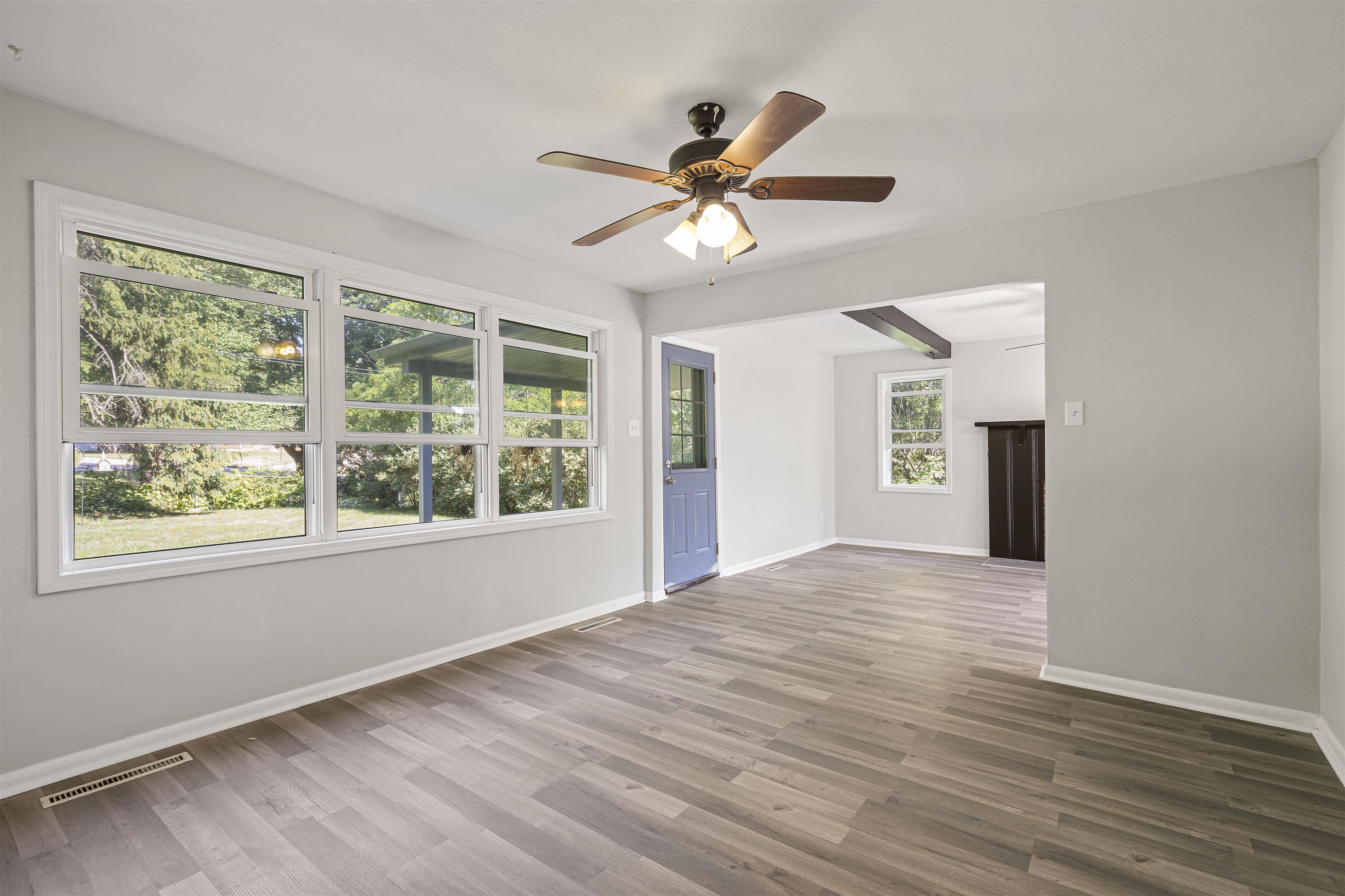 220 South Alpine Road Rockford, IL 61108 - Photo 4 of 18 a view of an empty room with wooden floor and a window