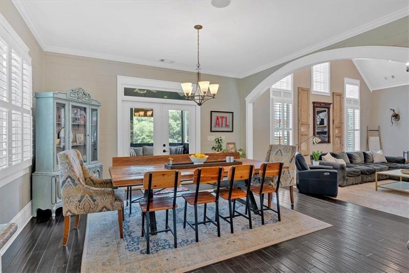 1021 Avery Road Canton, GA 30115 - Photo 17 of 70 a view of a dining room with furniture window and wooden floor