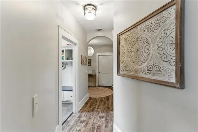 a view of room with bed and window