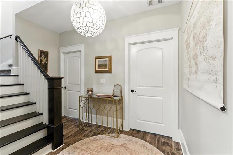 1021 Avery Road Canton, GA 30115 - Photo 22 of 70 a view of entryway with wooden floor