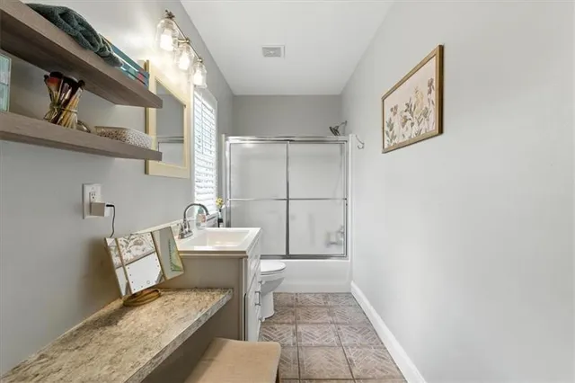 a room with furniture and a wooden floor