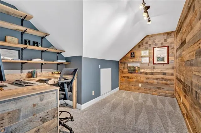 a view of a chair and table on the deck