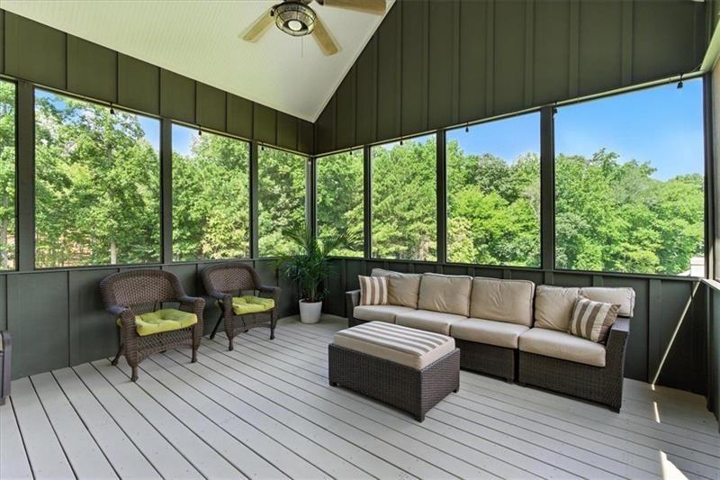1021 Avery Road Canton, GA 30115 - Photo 49 of 70 a living room with furniture and a large window