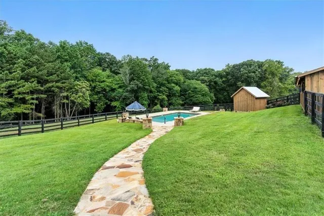 a view of a swimming pool and outdoor space