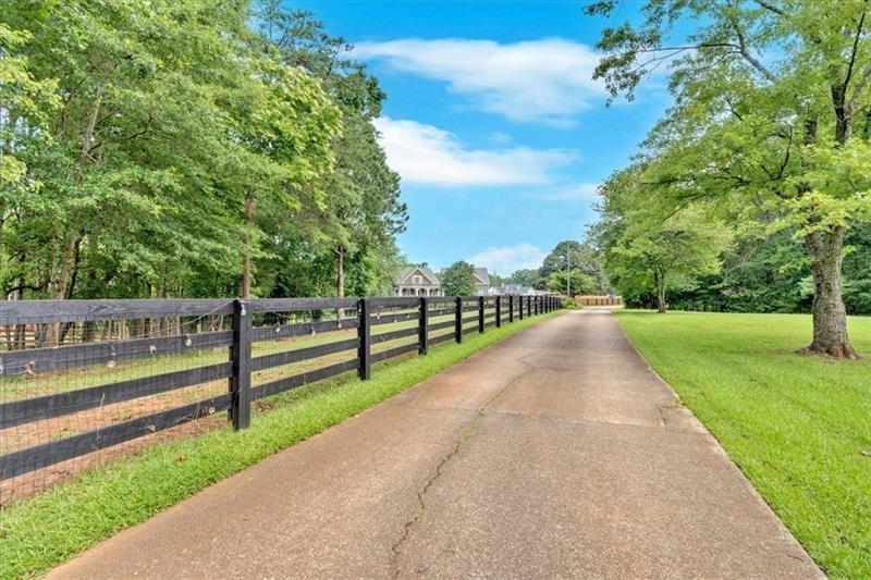1021 Avery Road Canton, GA 30115 - Photo 67 of 70 a view of a park with large trees