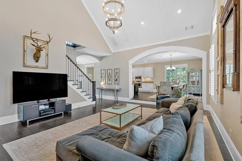 1021 Avery Road Canton, GA 30115 - Photo 10 of 70 a living room with furniture and a flat screen tv
