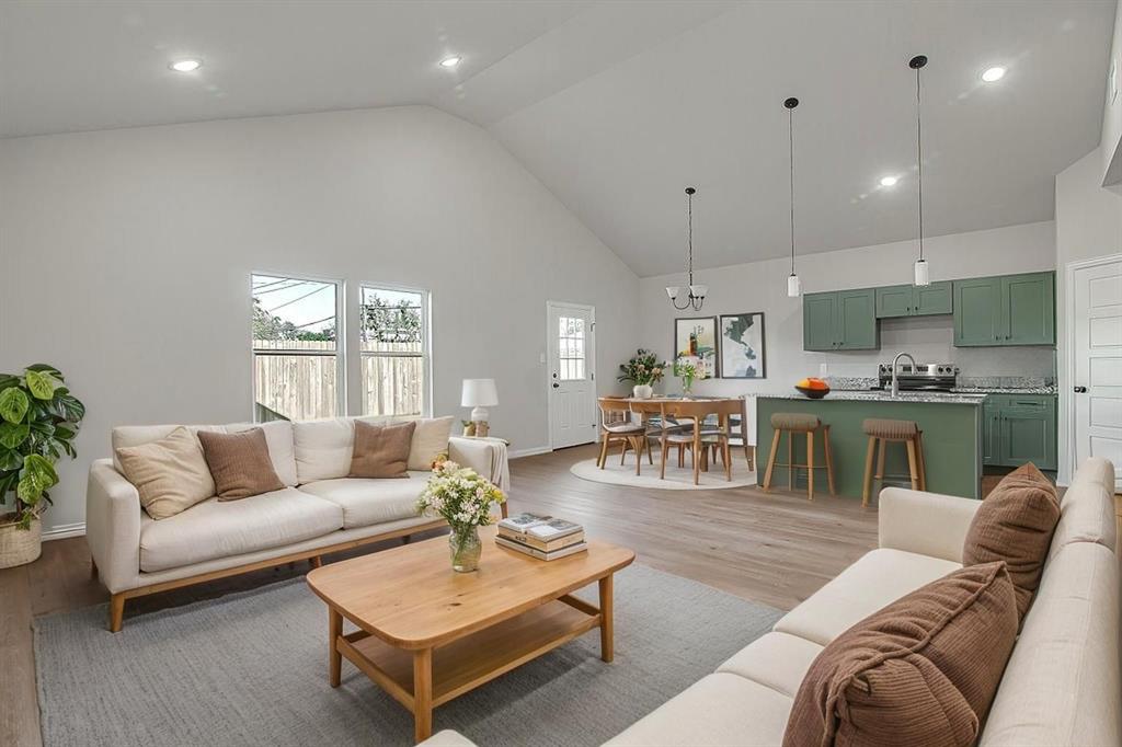 2729 Finley Street Fort Worth, TX 76111 - Photo 2 of 30 a living room with furniture and kitchen view