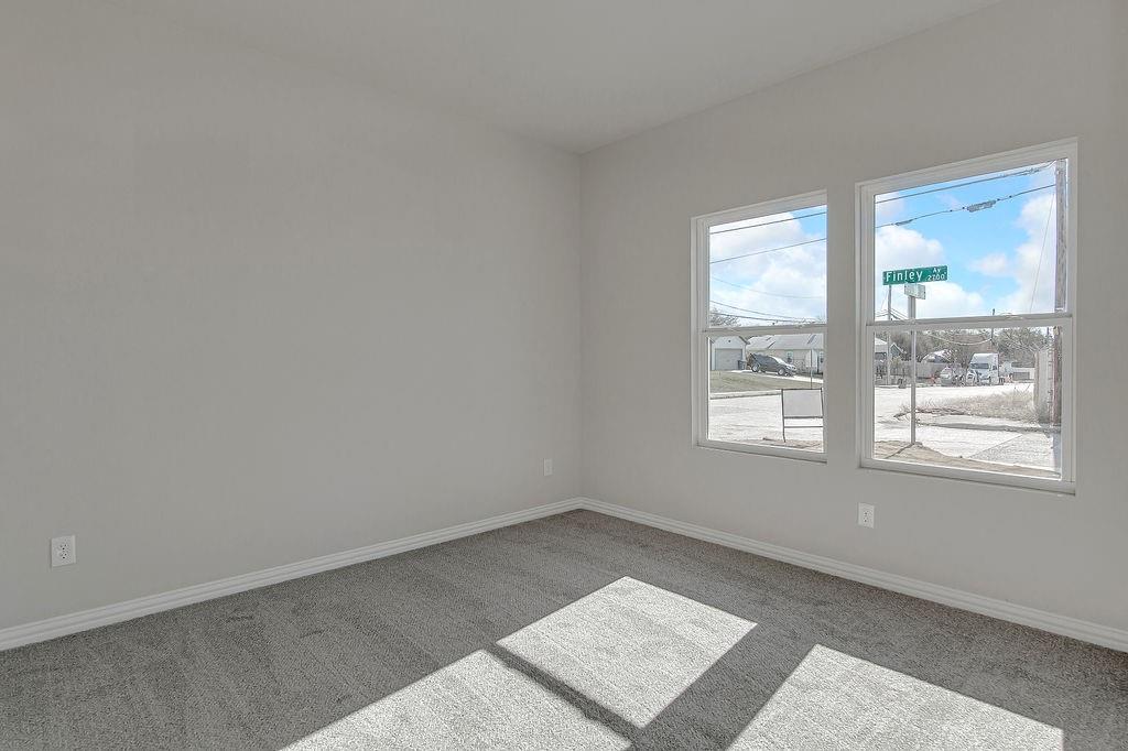 2729 Finley Street Fort Worth, TX 76111 - Photo 28 of 30 an empty room with a window