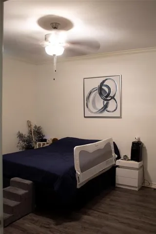 a living room with furniture and a lamp