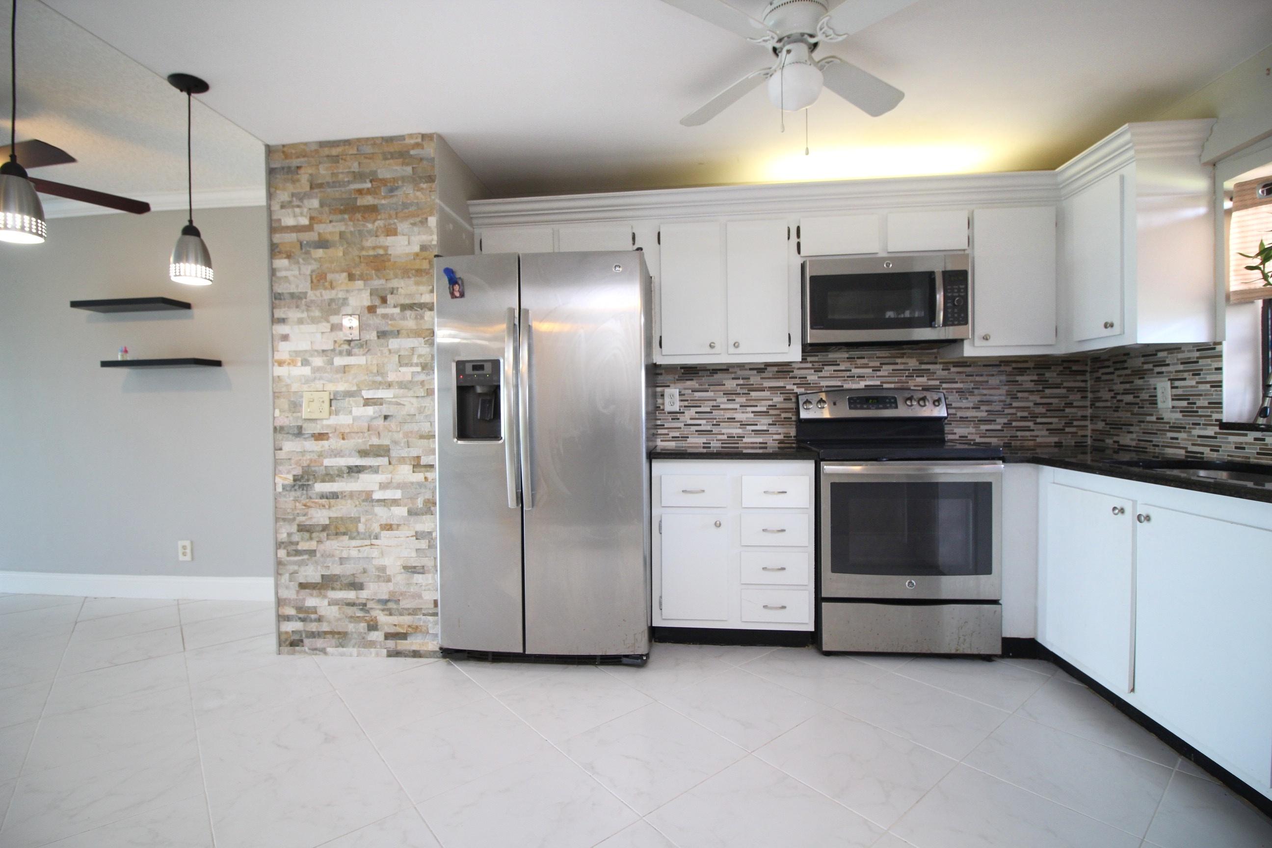1981 Woolbright Road, Unit E102 Boynton Beach, FL 33426 - Photo 2 of 37 IMG_4199-01
