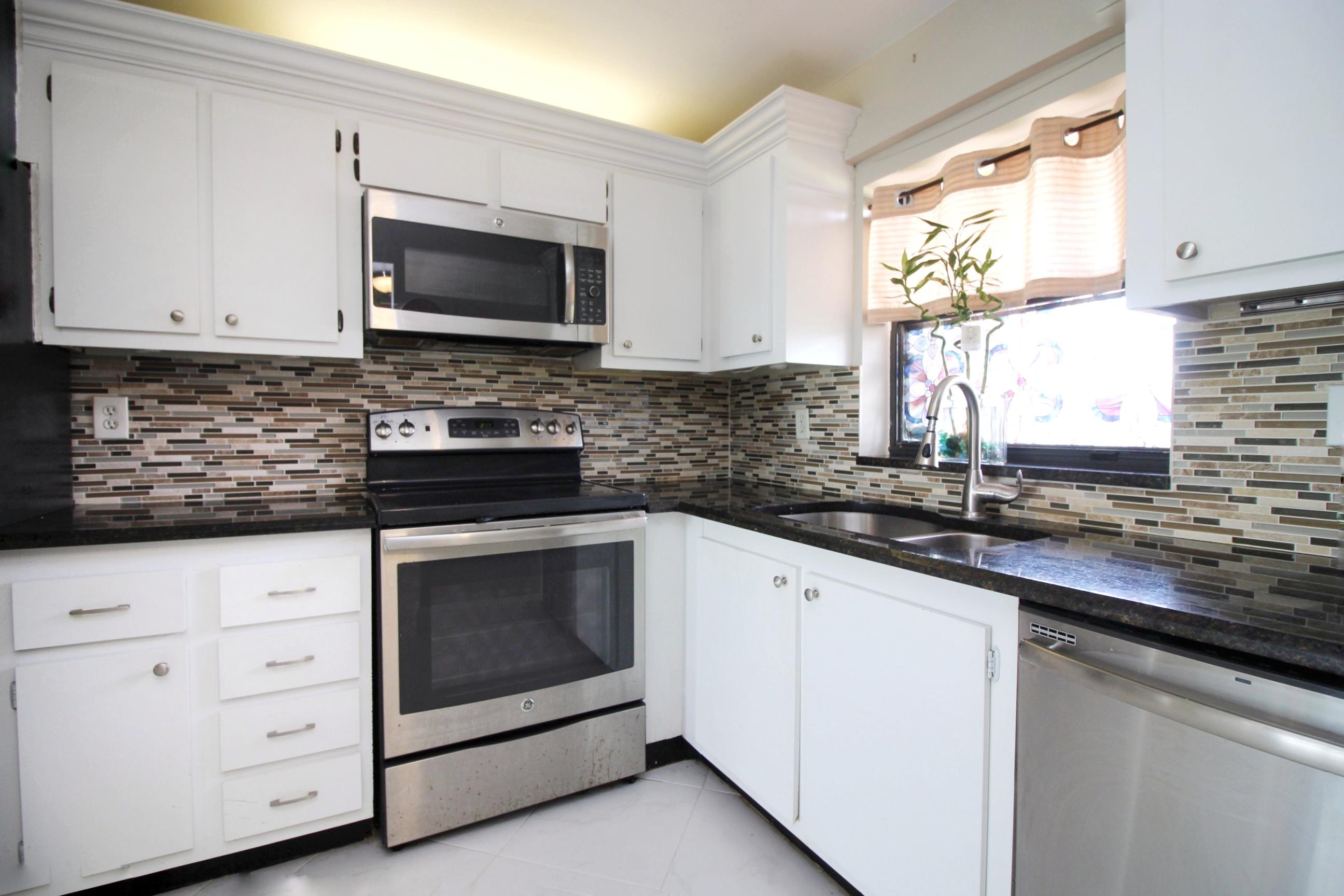 1981 Woolbright Road, Unit E102 Boynton Beach, FL 33426 - Photo 3 of 37 IMG_4206-01