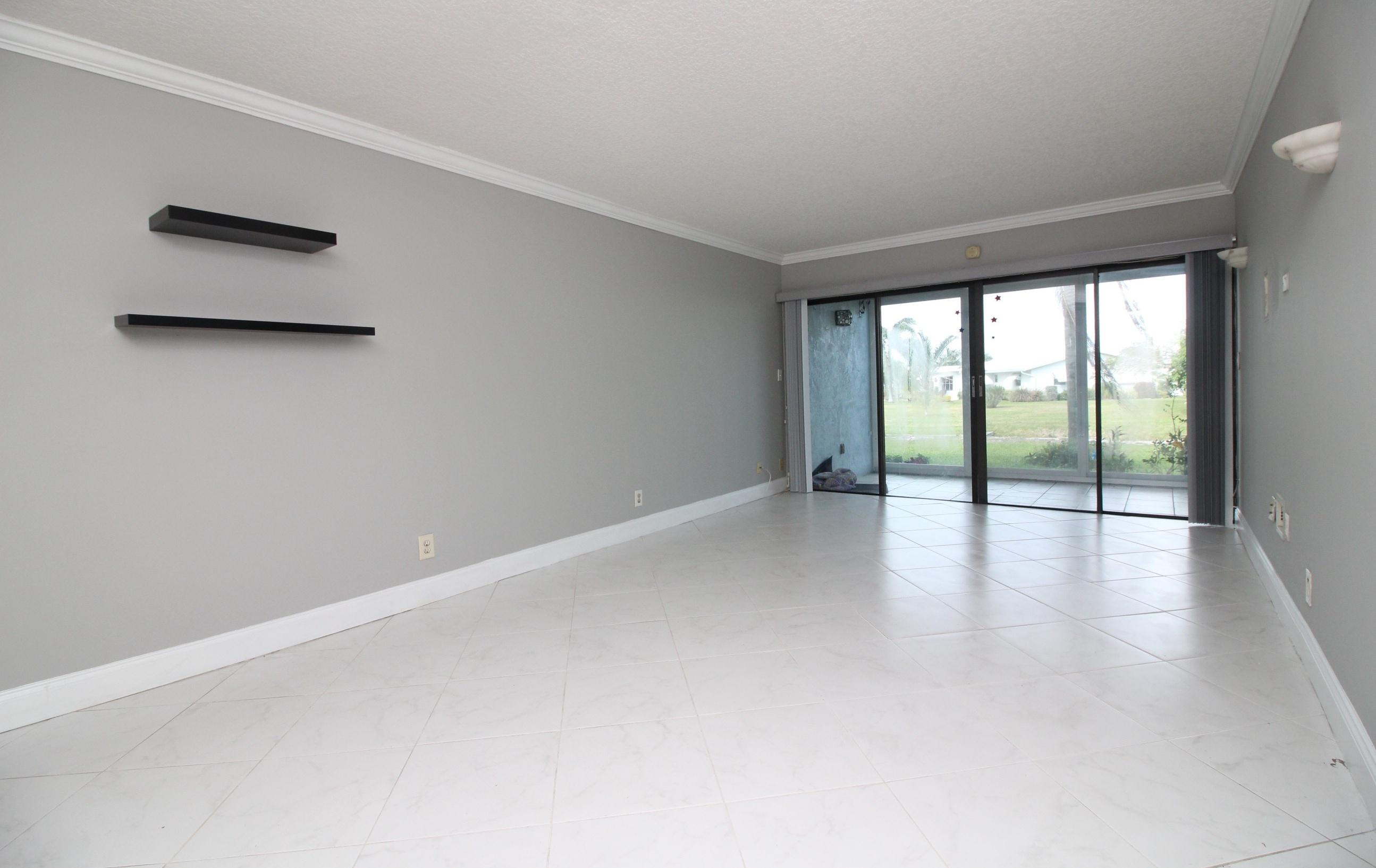 1981 Woolbright Road, Unit E102 Boynton Beach, FL 33426 - Photo 4 of 37 IMG_4210-01