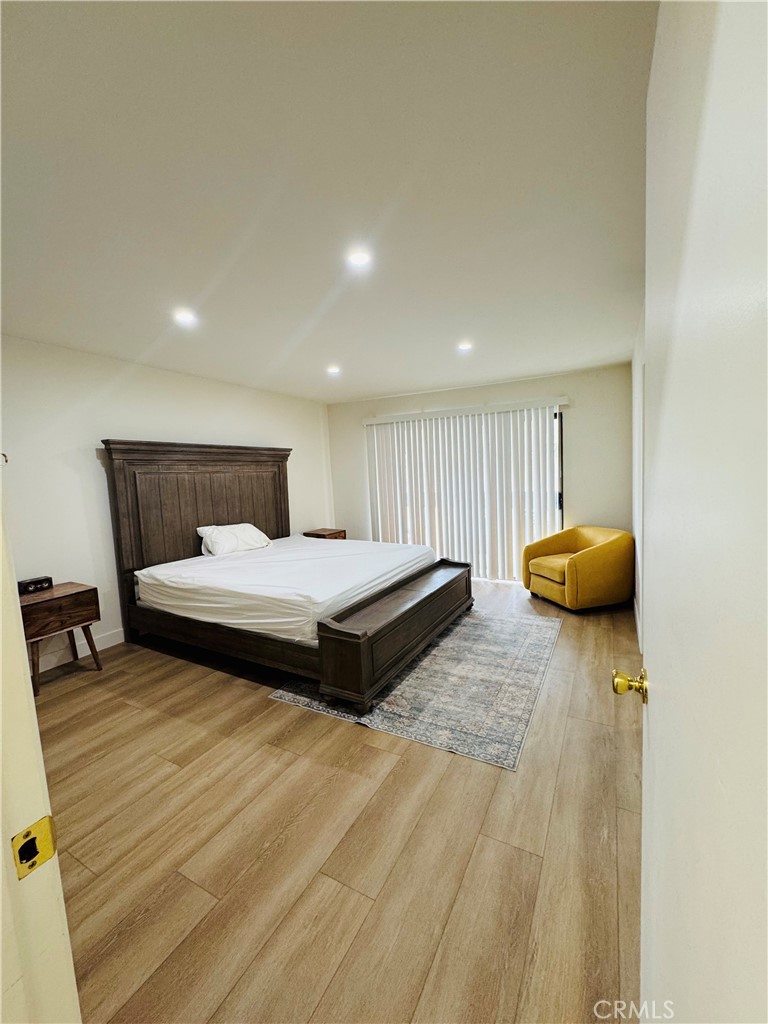 28202 Ridgepoint Court Rancho Palos Verdes, CA 90275 - Photo 19 of 33 a bedroom with bed and window