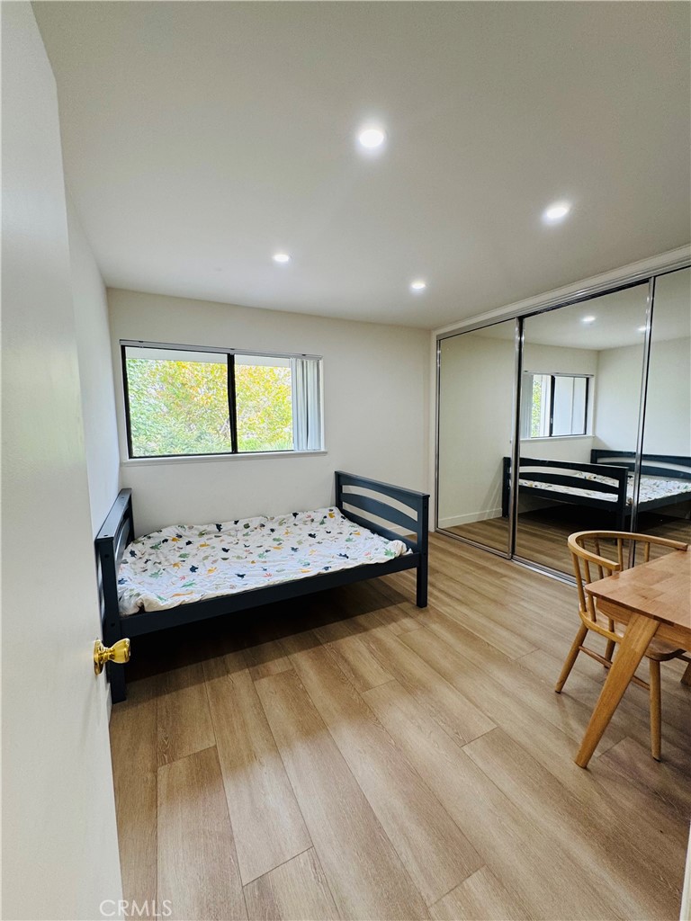 28202 Ridgepoint Court Rancho Palos Verdes, CA 90275 - Photo 21 of 33 a view of a room with wooden floor and furniture
