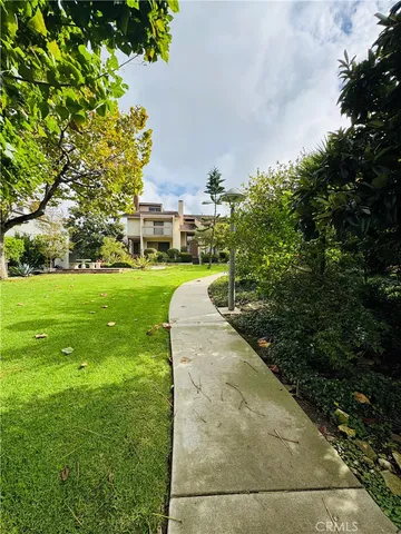 a view of a house with a big yard