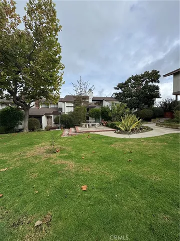 a view of a garden with pathway