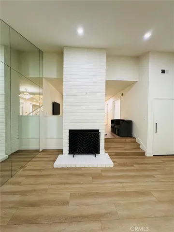 a living room with a fireplace