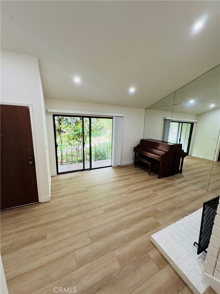 28202 Ridgepoint Court Rancho Palos Verdes, CA 90275 - Photo 5 of 33 a view of a room with wooden floor and a window