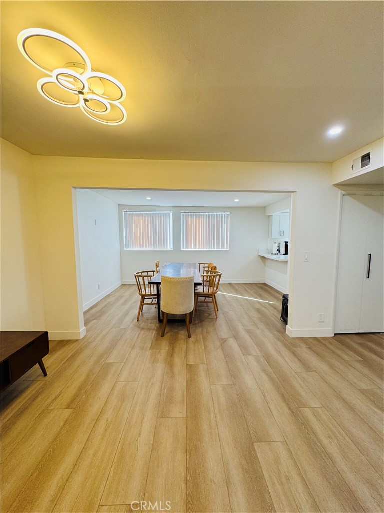 28202 Ridgepoint Court Rancho Palos Verdes, CA 90275 - Photo 10 of 33 a living room with a table and chairs