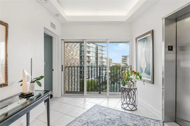 a bedroom with a bed couch and window