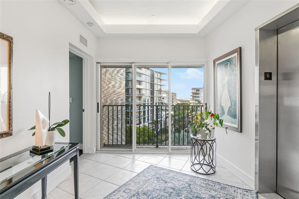 660 Golden Gate Point, Unit 61 Sarasota, FL 34236 - Photo 10 of 44 a view of a entryway of the house