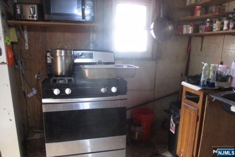 197 Fairmount Avenue Newark, NJ 07103 - Photo 3 of 10 a close view of water heater