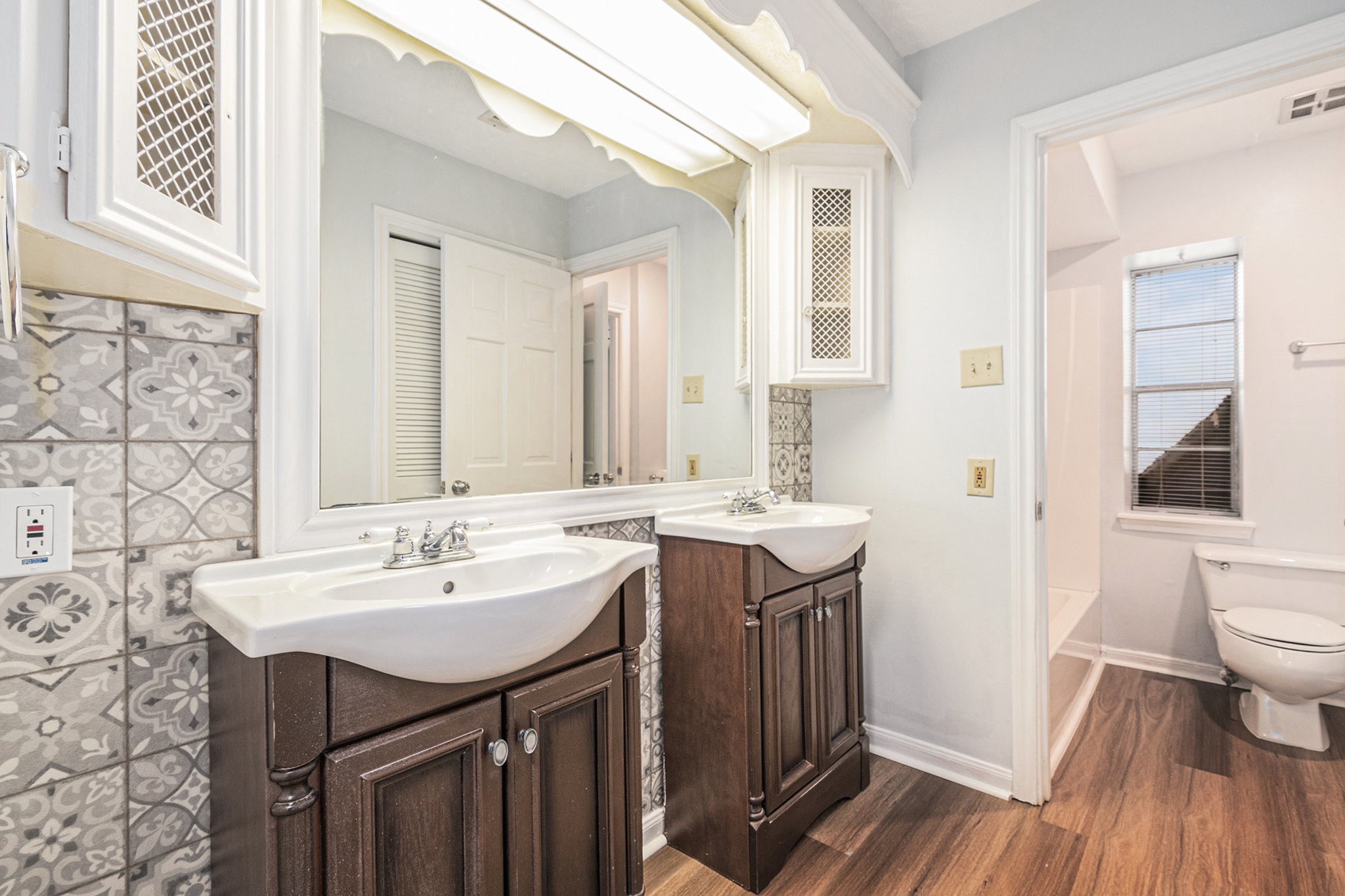 6307 Bayonne Drive Spring, TX 77389 - Photo 25 of 47 a bathroom with a sink and a mirror