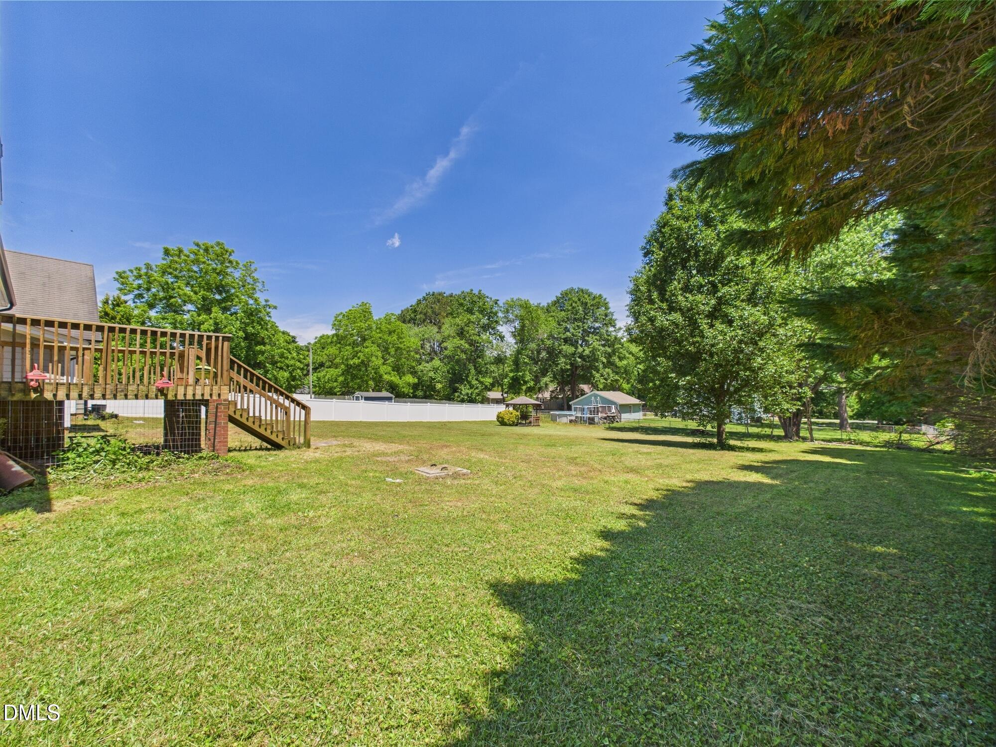 10917 Fanny Brown Road Raleigh, NC 27603 - Photo 45 of 54 a view of a swimming pool with an outdoor space and seating area
