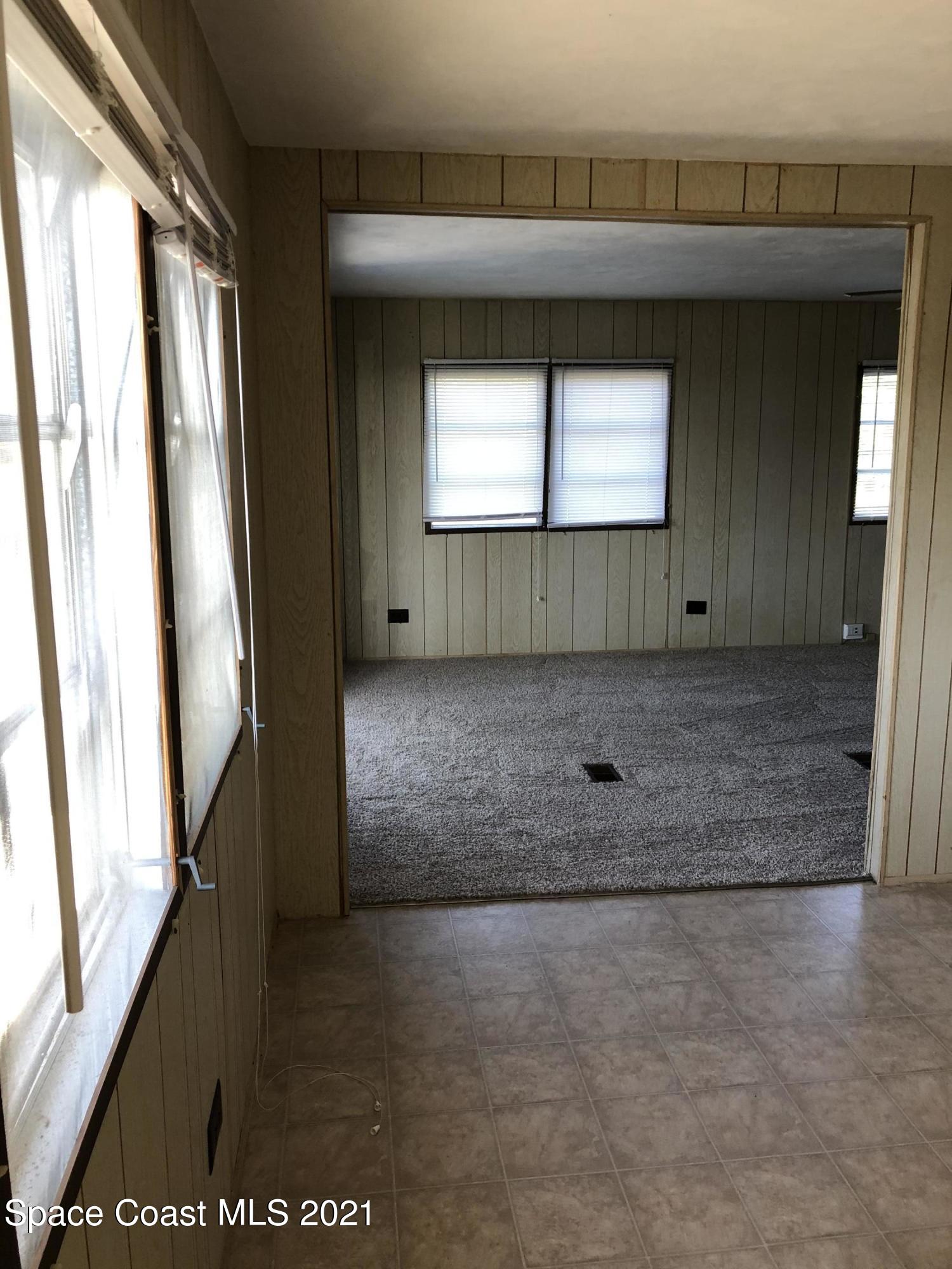 401 Hawk Drive Sebastian, FL 32976 - Photo 19 of 23 a view of entryway and kitchen