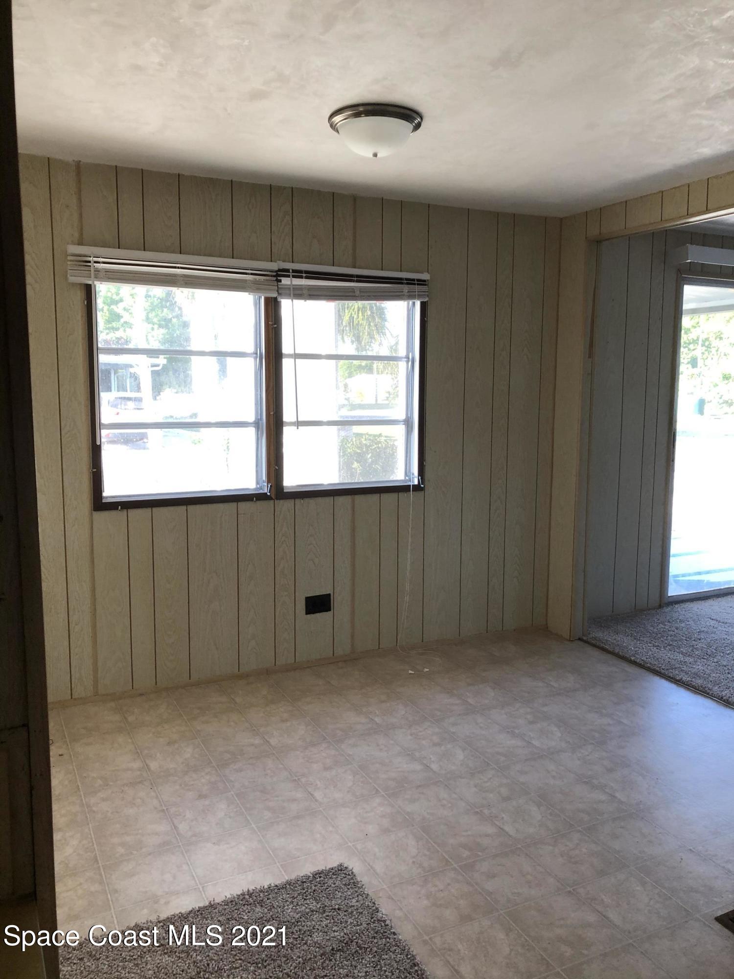 401 Hawk Drive Sebastian, FL 32976 - Photo 20 of 23 an empty room with a window