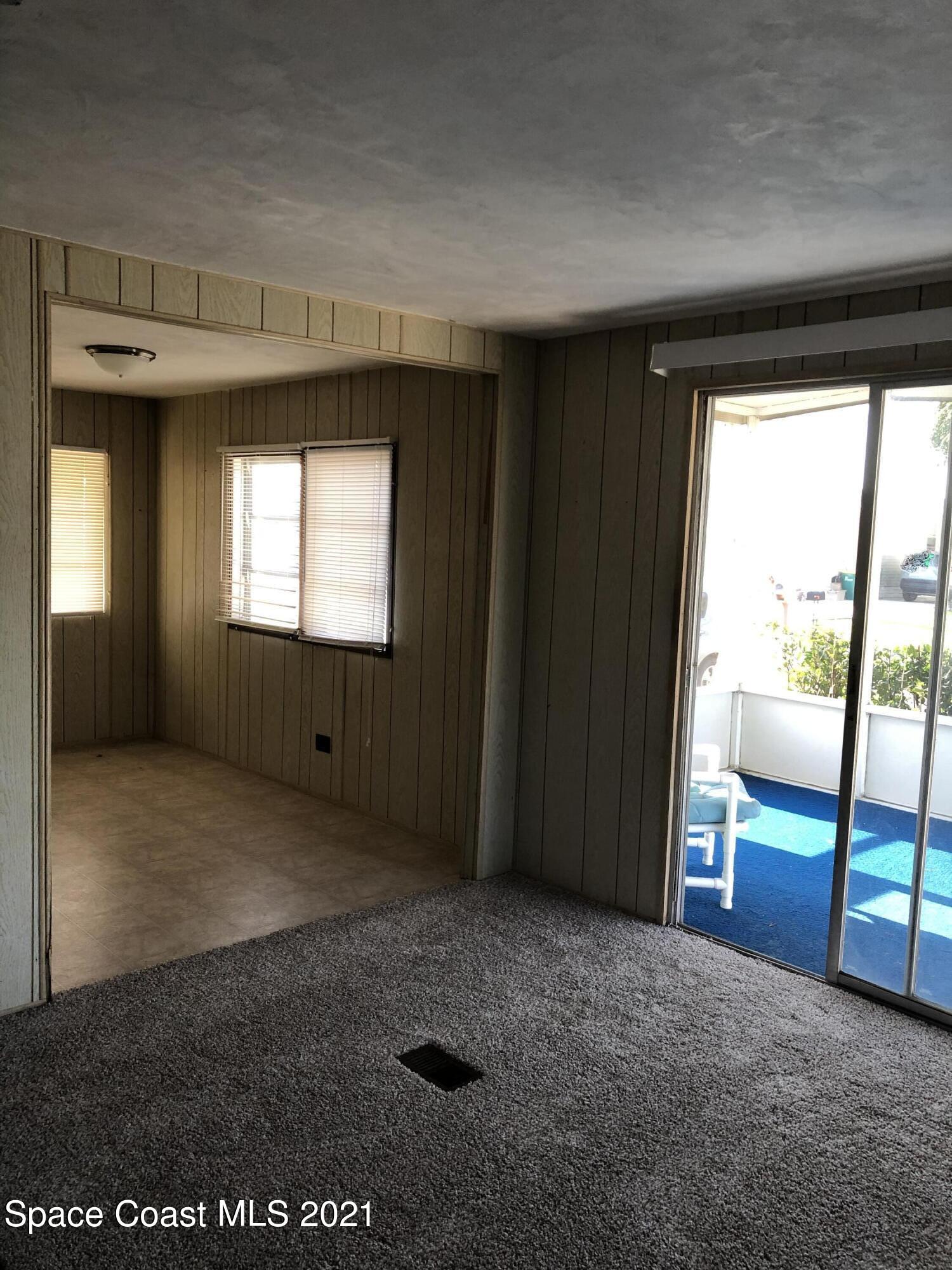 401 Hawk Drive Sebastian, FL 32976 - Photo 22 of 23 an empty room with windows