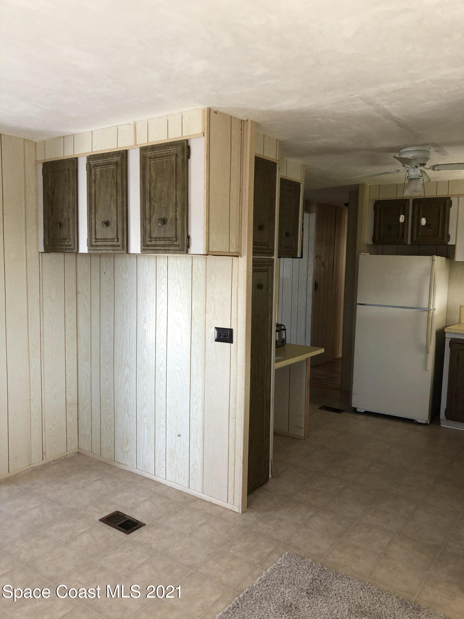 401 Hawk Drive Sebastian, FL 32976 - Photo 6 of 23 a view of a hallway with an entryway