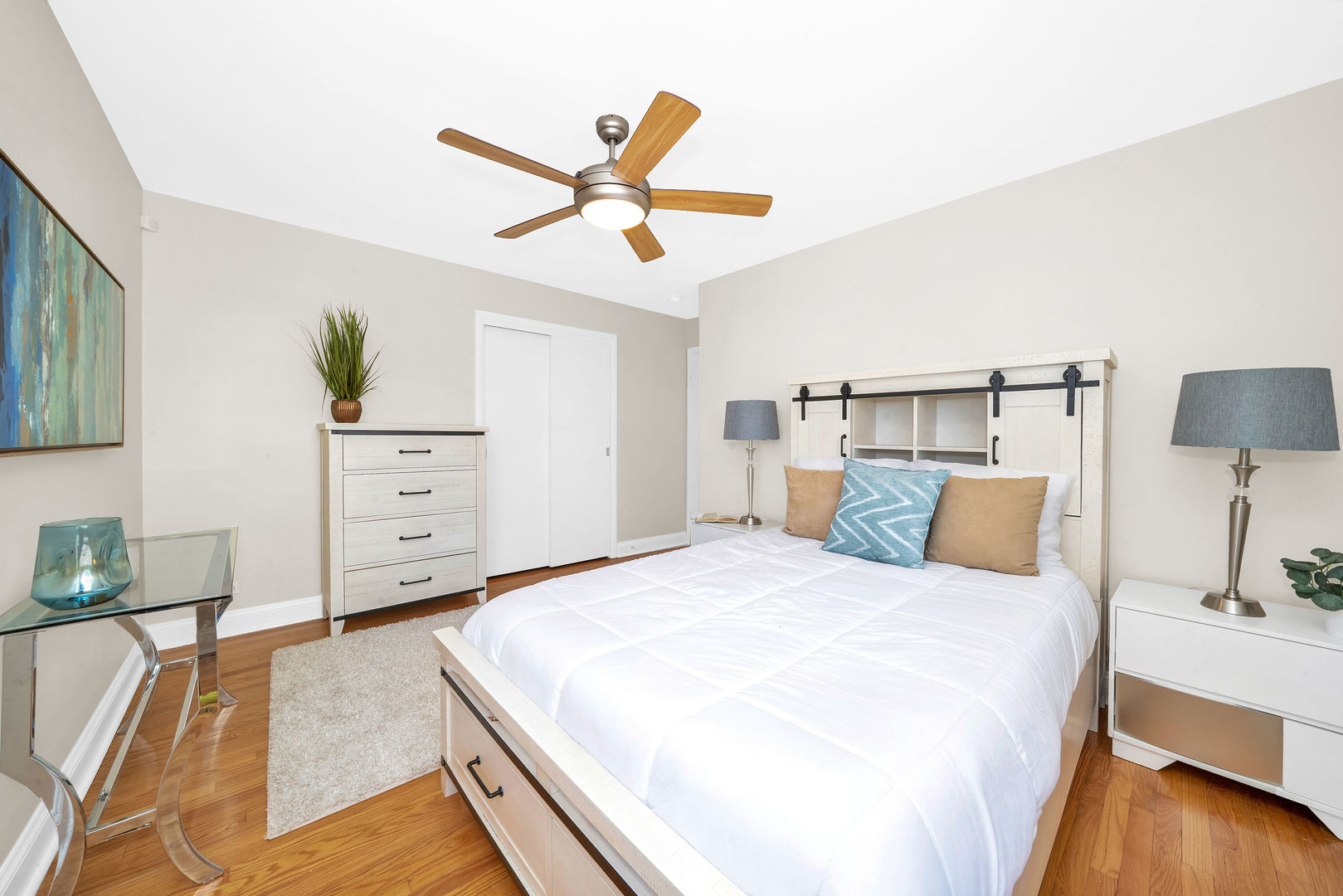 617 South Western Avenue Park Ridge, IL 60068 - Photo 15 of 40 a bedroom with a bed and a chandelier