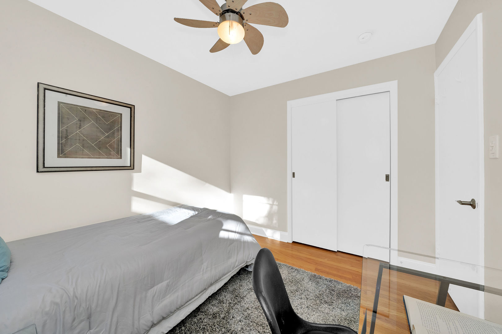 617 South Western Avenue Park Ridge, IL 60068 - Photo 22 of 40 a bedroom with a bed and wooden floor