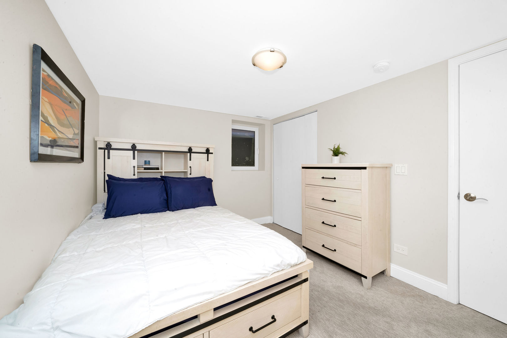 617 South Western Avenue Park Ridge, IL 60068 - Photo 31 of 40 a bedroom with a large bed and dresser