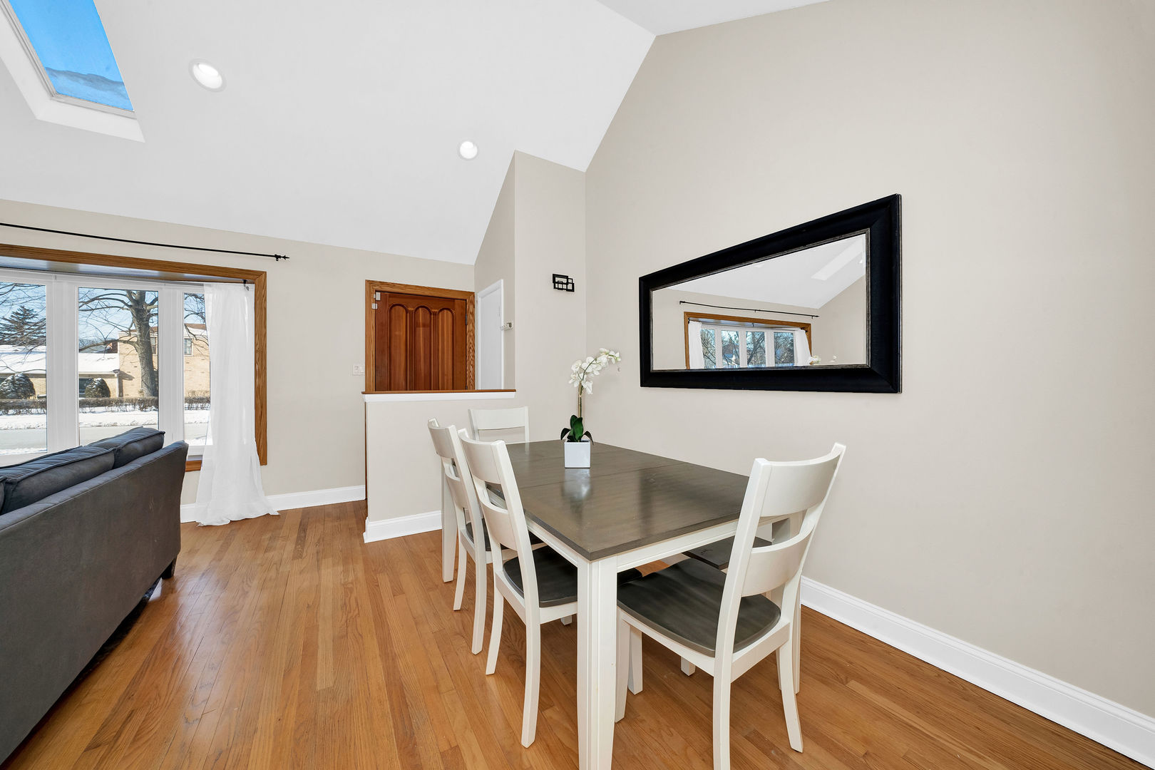 617 South Western Avenue Park Ridge, IL 60068 - Photo 8 of 40 a view of a dining room with furniture and wooden floor