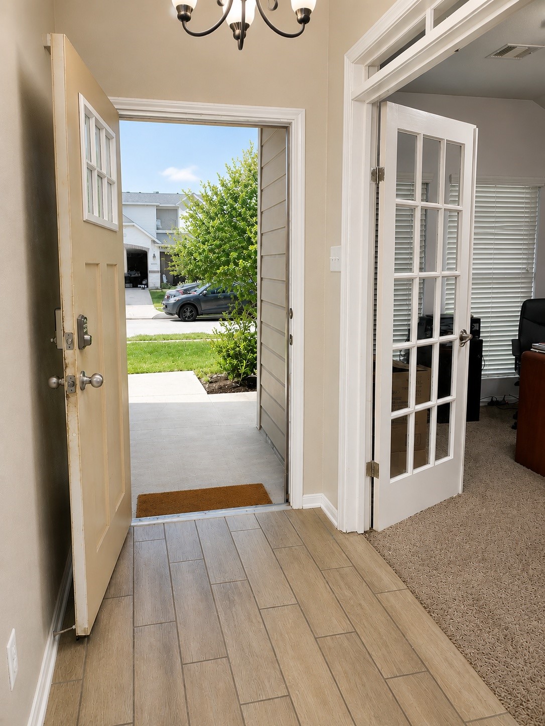 1058 Ranch Oak Drive Houston, TX 77073 - Photo 5 of 27 Bright foyer with elegant entry and wood-look tile flooring