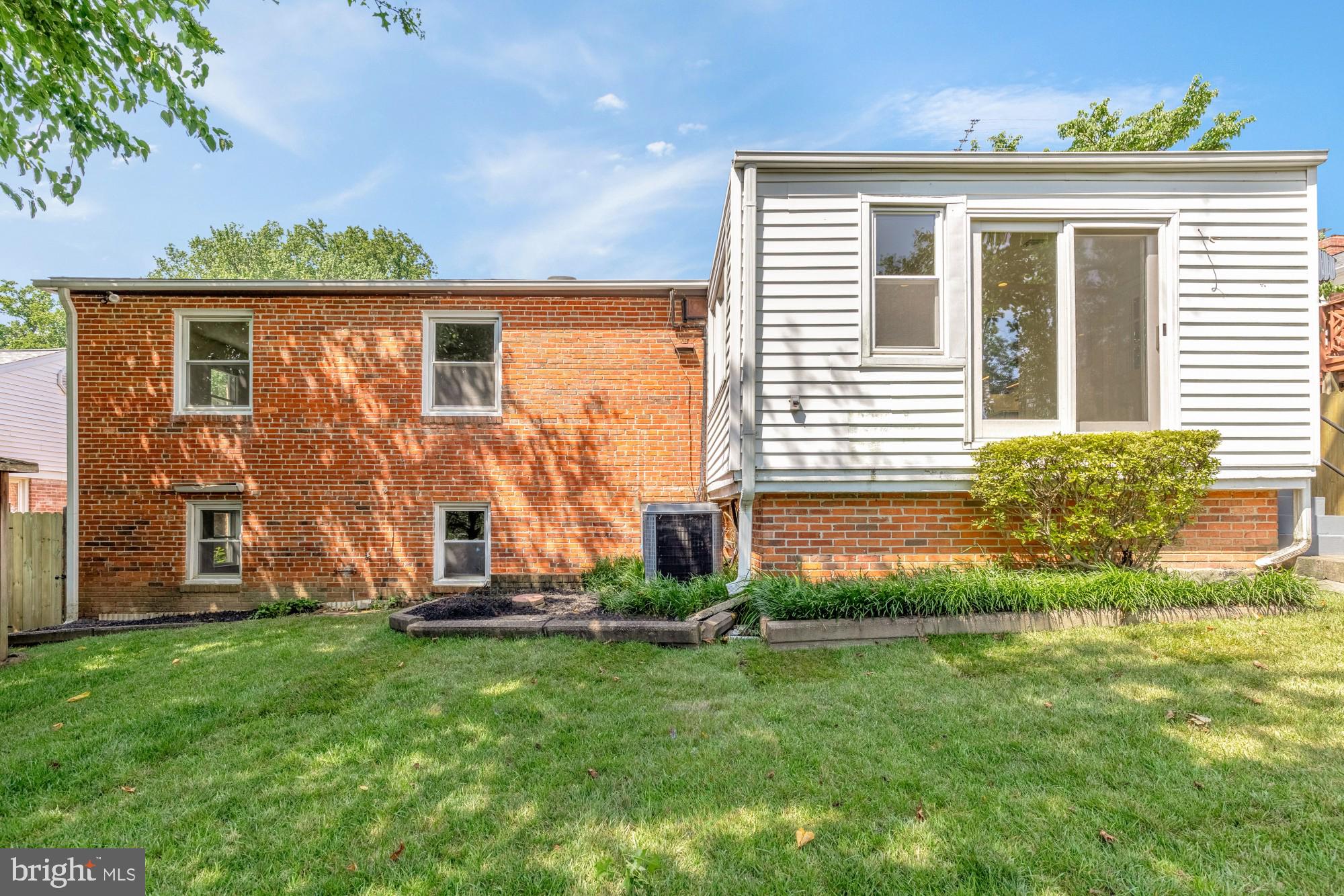 8921 Whitney Street Silver Spring, MD 20901 - Photo 27 of 27 front view of a house with a big yard