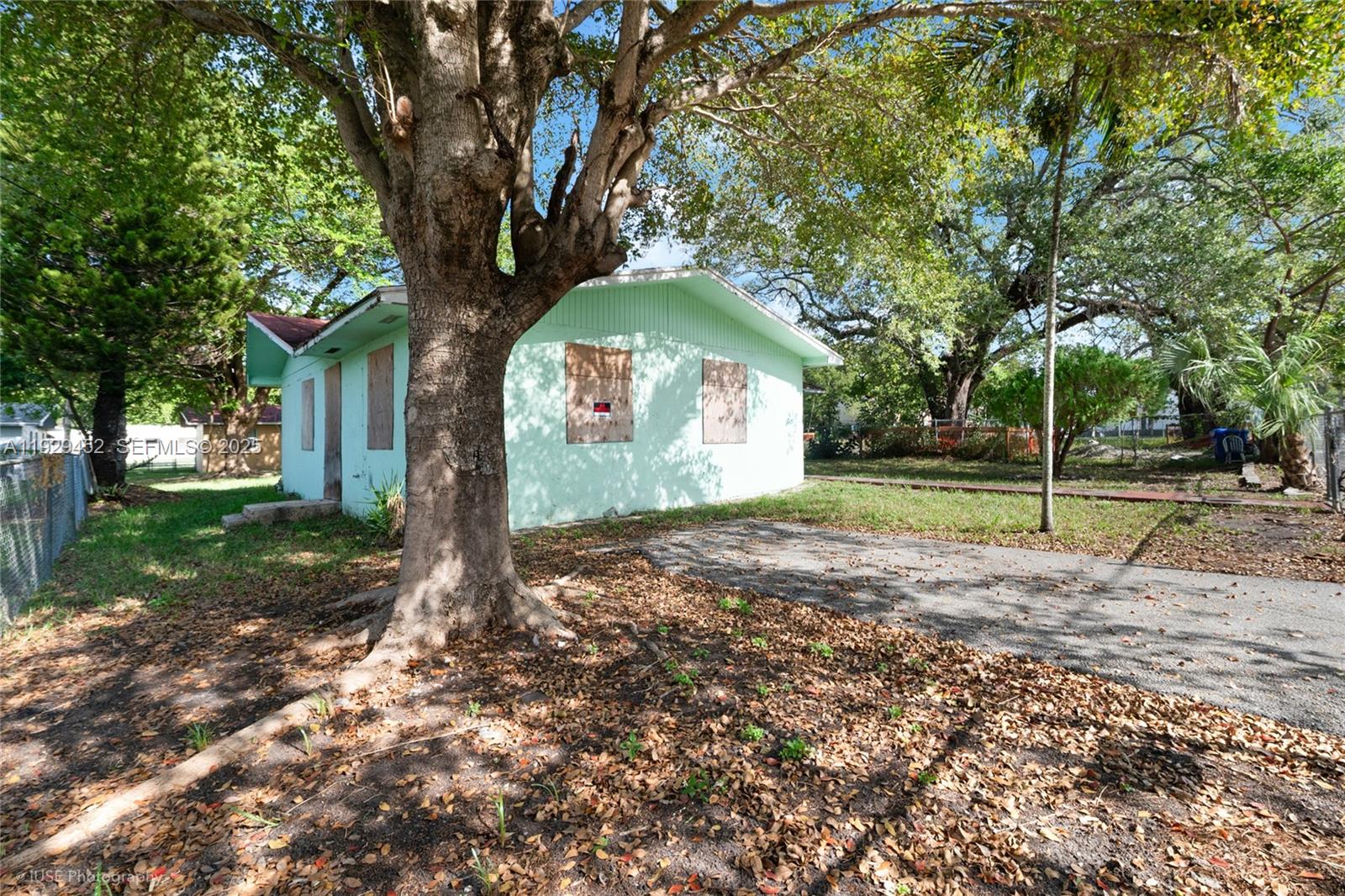 3715 Oak Avenue Miami, FL 33133 - Photo 13 of 26 a view of a house with a yard