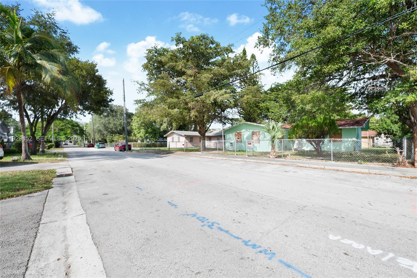 3715 Oak Avenue Miami, FL 33133 - Photo 23 of 26 a view of street with houses