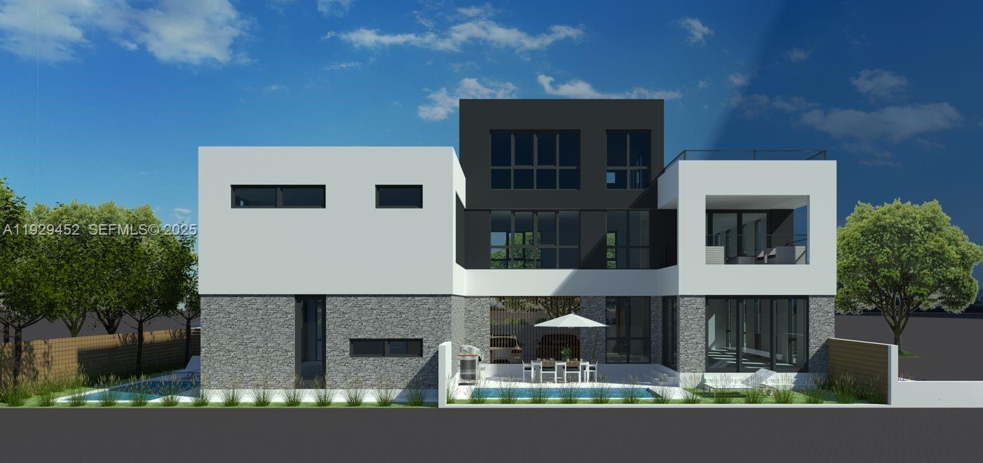 3715 Oak Avenue Miami, FL 33133 - Photo 3 of 26 a house view with a garden space